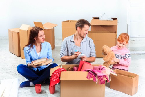 Packed boxes and furniture ready for transport in Surrey