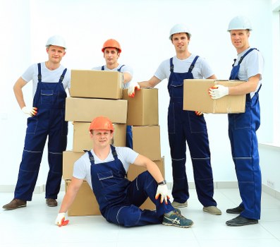 Surrey Man and Van team loading items safely into a vehicle