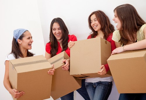 Staff member assessing moving task safety before lifting