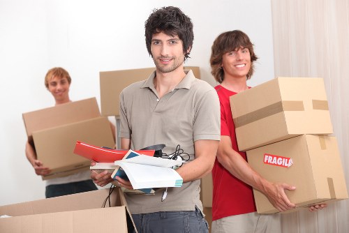 Local moving team handling residential packing in Surrey