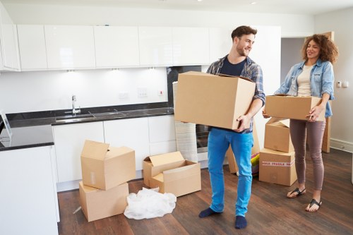 Moving team organizing boxes for a Surrey relocation