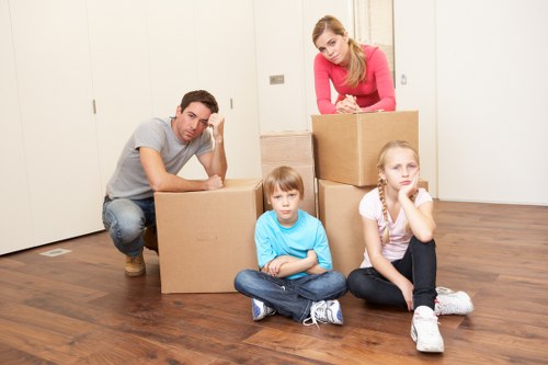 Homeowner organizing boxes before moving day in Surrey