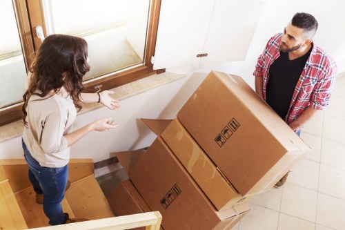 Packed moving boxes ready for a Surrey house move