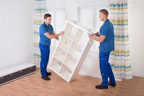 Fast removals team loading furniture for a same day move in Surrey