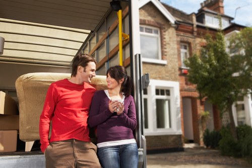 Office furniture pick-up in Surrey with desks and chairs being loaded