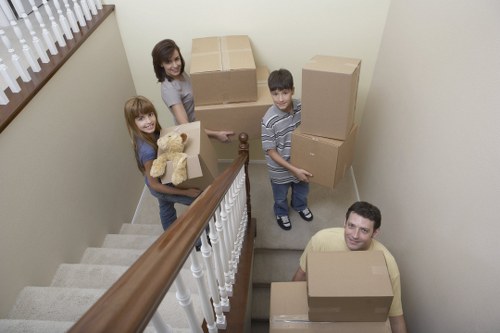 Surrey movers unloading boxes into a new home